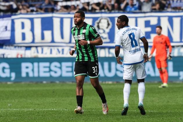 Brooklyn Ezeh Hannover 96,37 and Bryan Teixeira 1 FC Magdeburg,8 2 Soccer Bundesliga Season 2023 2024 1 FC Magdeburg vs Hannover 96 at the MDCC Arena in Magdeburg Action,Soccer,Man,Men,Germany,31 03 2024
