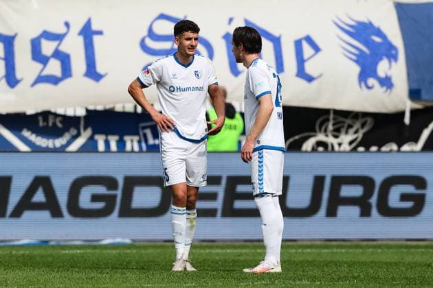 Daniel Elfadli l ,1 FC Magdeburg,6 with Jean Hugonet 1 FC Magdeburg,24 2 Soccer Bundesliga Season 2023 2024 1 FC Magdeburg vs Hannover 96 at the MDCC Arena in Magdeburg Action,Soccer,Man,Men,Germany,31 03 2024