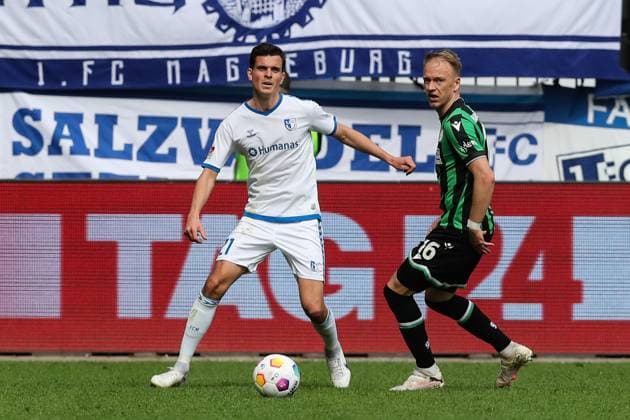 Tobias Müller 1 FC Magdeburg,21 vs Havard Nielsen Hannover 96,16 2 Soccer Bundesliga Season 2023 2024 1 FC Magdeburg vs Hannover 96 at the MDCC Arena in Magdeburg Action,Soccer,Man,Men,Germany,31 03 2024
