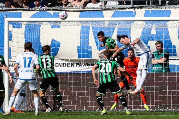 Nicolo Tresoldi Hannover 96,9 vs Jean Hugonet 1 FC Magdeburg,24 2 Soccer Bundesliga Season 2023 2024 1 FC Magdeburg vs Hannover 96 at the MDCC Arena in Magdeburg Action,Soccer,Man,Men,Germany,31 03 2024