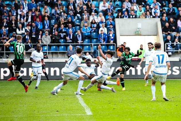 Goalscorer Sei Muroya Hannover 96,21 scores to 0 2 against Daniel Heber 1 FC Magdeburg,15 and Daniel Elfadli 1 FC Magdeburg,6 2 Soccer Bundesliga Season 2023 2024 1 FC Magdeburg vs Hannover 96 at the MDCC Arena in Magdeburg Action,Soccer,Man,Men,Germany,31 03 2024