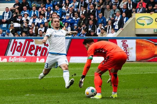 Baris Atik 1 FC Magdeburg,23 vs Goalkeeper Ron Robert Zieler Hannover 96,1 2 Soccer Bundesliga Season 2023 2024 1 FC Magdeburg vs Hannover 96 at the MDCC Arena in Magdeburg Action,Soccer,Man,Men,Germany,31 03 2024