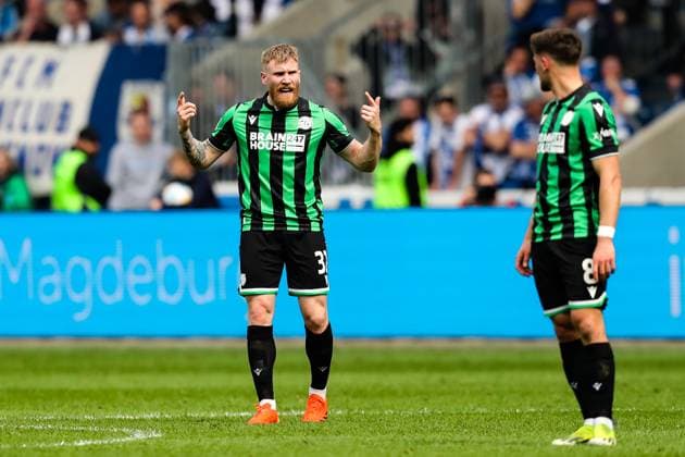 Andreas Voglsammer l ,Hannover 96,32 and Enzo Leopold Hannover 96,8 2 Soccer Bundesliga Season 2023 2024 1 FC Magdeburg vs Hannover 96 at the MDCC Arena in Magdeburg Action,Soccer,Man,Men,Germany,31 03 2024