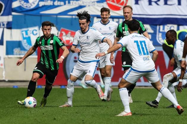 Enzo Leopold Hannover 96,8 vs Jean Hugonet 1 FC Magdeburg,24 and Jason Ceka 1 FC Magdeburg,10 2 Soccer Bundesliga Season 2023 2024 1 FC Magdeburg vs Hannover 96 at the MDCC Arena in Magdeburg Action,Soccer,Man,Men,Germany,31 03 2024