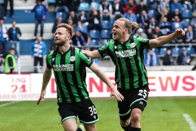 Goalscorer Cedric Teuchert Hannover 96,36 scores to 0 3 with Lars Timo Gindorf Hannover 96,25 2 Soccer Bundesliga Season 2023 2024 1 FC Magdeburg vs Hannover 96 at the MDCC Arena in Magdeburg Action,Soccer,Man,Men,Germany,31 03 2024