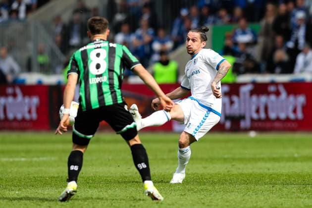 Baris Atik 1 FC Magdeburg,23 vs Enzo Leopold Hannover 96,8 2 Soccer Bundesliga Season 2023 2024 1 FC Magdeburg vs Hannover 96 at the MDCC Arena in Magdeburg Action,Soccer,Man,Men,Germany,31 03 2024