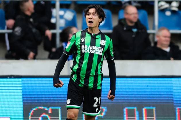 Goal celebration goal scorer Sei Muroya Hannover 96,21 scores to 0 2 2 Soccer Bundesliga season 2023 2024 1 FC Magdeburg vs Hannover 96 at the MDCC Arena in Magdeburg single picture, action,soccer,man,men,Germany,31 03 2024