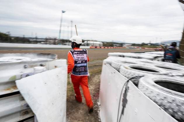 April 5, 2024, Suzuka, Mie, Japan: Track intervention marshals rushing to assist Logan Sargent after the Williams driver crashed while racing during FP1 on practice day of the 2024 Formula 1 Japanese Grand Prix. Suzuka Japan - ZUMAb177 20240405_aap_b177_088 Copyright: xTaidghxBarronx