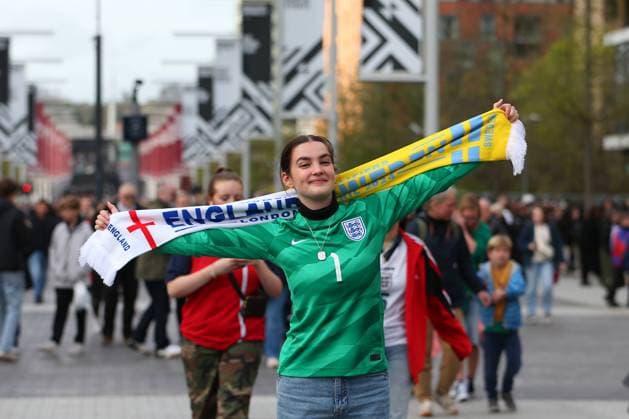 5th April 2024; Wembley Stadium, London, England; UEFA Womens EURO Qualifying, EM, Europameisterschaft International Football, England versus Sweden; England fan arriving at the stadium ahead of the match.  ActionPlus12625805 KatiexChan