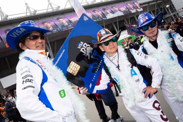 April 6, 2024, Suzuka, Mie, Japan: Racing fans for Visa CashApp RB F1 Team and Yuki Tsunoda in cowboy and credit card cosplay on Qualifying day of the 2024 Formula 1 Japanese Grand Prix. Suzuka Japan - ZUMAb177 20240406_aap_b177_002 Copyright: xTaidghxBarronx
