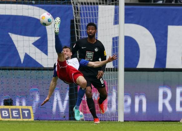 2 Liga Season 2023 2024 28 Matchday 06 04 2024 Hamburger SV 1 FC Kaiserslautern at Volksparkstadion v l Jonas Meffert Hamburger SV , Almamy Toure 1 FC Kaiserslautern DFL REGULATIONS PROHIBIT ANY USE OF PHOTOGRAPHS AS IMAGE SEQUENCES AND OR QUASI VIDEO