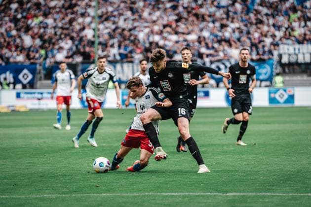 Soccer Men Season 2023 2024 2 Soccer Bundesliga 28 Matchday Hamburger SV vs 1 FC Kaiserslautern 06 04 2024 Anssi Suhonen 36, HSV goes down against Julian Niehues 16, 1 FC Kaiserslautern Hamburg Volksparkstadion Hamburg Germany