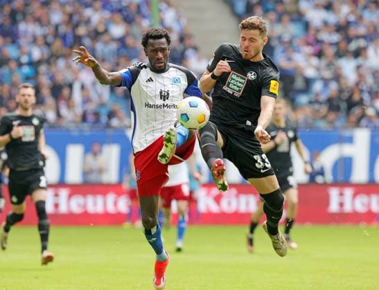 2 Liga Season 2023 2024 28 Matchday 06 04 2024 Hamburger SV 1 FC Kaiserslautern at Volksparkstadion v l Bakery Jatta Hamburger SV , Jan Elvedi 1 FC Kaiserslautern DFL REGULATIONS PROHIBIT ANY USE OF PHOTOGRAPHS AS IMAGE SEQUENCES AND OR QUASI VIDEO