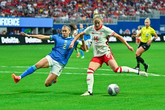 ATLANTA, GA Ã APRIL 05: Canada forward Janine Beckie (16) takes a shot as Brazil defender Antonia (2) defends during the SheBelieves Cup match between Brazil and Canada on April 5th, 2024 at Mercedes-Benz Stadium in Atlanta, GA. (Photo by Rich von Biberstein Icon Sportswire) SOCCER: APR 06 Women s SheBelieves Cup - Brazil vs Canada EDITORIAL USE ONLY Icon240405044