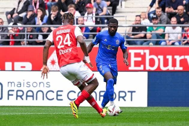 Jeremie BOGA ( 7 - Nice ) and Emmanuel Agbadou ( 24 - Reims ) during the Ligue 1 match between Stade de Reims and OGC Nice at Stade Auguste Delaune on April 07, 2024 in Reims, France. ( Photo by federico pestellini panoramic ) - FOOTBALL : Reims vs Nice - Ligue 1 - 07 04 2024 FedericoPestellini Panoramic 