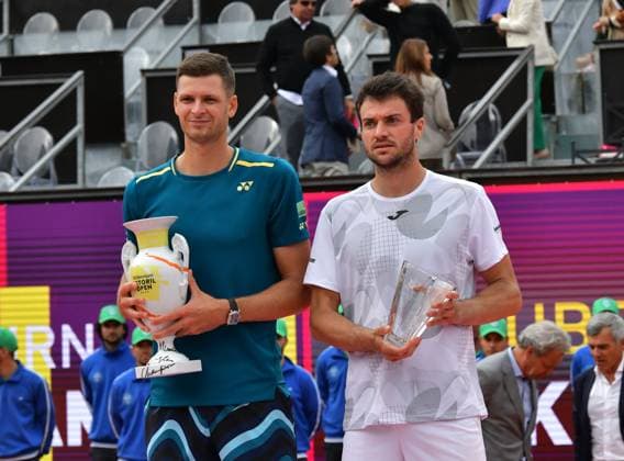 Hubert Hurkacz Poland wins the Estoril Open in Portugal Estoril Open, Portugal, April 7, 2024, Final Hubert Hurkacz Poland, left wins the Estoril Open in Portugal by defeating Pedro Martinez Spain in the final It was the first international tournament win for Hurkacz at a clay court tournament Estoril Estoril Tennis Club Lisbon Portugal