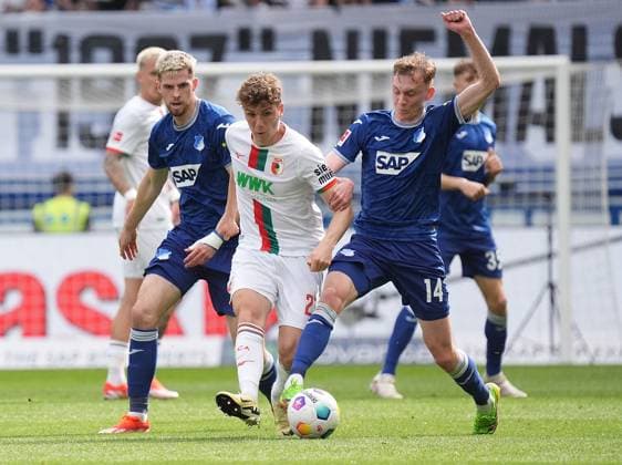 Sport Themen der Woche KW14 Sport Bilder des Tages GER, 1.FBL, TSG 1899 Hoffenheim vs FC Augsburg 07.04.2024, PreZero-Arena, Sinsheim, GER, 1.FBL, TSG 1899 Hoffenheim vs FC Augsburg , DFL regulations prohibit any use of photographs as image sequences and or quasi-video. im Bild Arne Engels (Augsburg), Anton Stach (Hoffenheim), Maximilian Beier (Hoffenheim) Sinsheim PreZero-Arena Deutschland *** GER, 1 FBL, TSG 1899 Hoffenheim vs FC Augsburg 07 04 2024, PreZero Arena, Sinsheim, GER, 1 FBL, TSG 1899 Hoffenheim vs FC Augsburg , DFL regulations prohibit any use of photographs as image sequences and or quasi video in picture Arne Engels Augsburg , Anton Stach Hoffenheim , Maximilian Beier Hoffenheim Sinsheim PreZero Arena Germany ,EDITORIAL USE ONLY