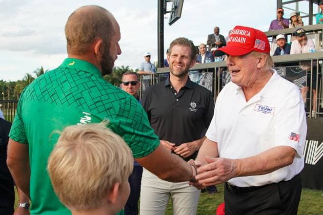 April 7, 2024, Doral, Florida, USA: (L-R) Dean Burmester of Stinger, Eric Trump and former president Donald Trump congratulates after winning the individual event after the final round of LIV Golf Miami at Trump National Doral. Doral USA - ZUMAw109 20240407_fap_w109_027 Copyright: xDebbyxWongx