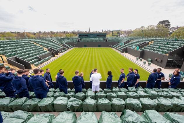 AFC Wimbledon Wimbledon Tennis Training Session AELTC Head Coach Dan Bloxham talks to AFC Wimbledon coaching staff and players during an AFC Wimbledon team visit to The All England Lawn Tennis and Croquet Club, Wimbledon, United Kingdom on 8 April 2024. Editorial use only , Copyright: xIanxStephenx PSI-19409-0029