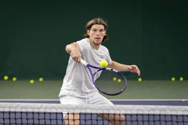 AFC Wimbledon Wimbledon Tennis Training Session AFC Wimbledon forward Josh Davison (9) plays tennis during an AFC Wimbledon team visit to The All England Lawn Tennis and Croquet Club, Wimbledon, United Kingdom on 8 April 2024. Editorial use only , Copyright: xIanxStephenx PSI-19409-0077