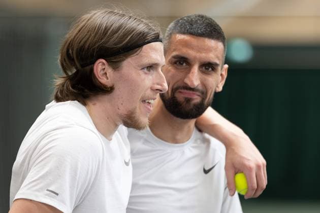 AFC Wimbledon Wimbledon Tennis Training Session AFC Wimbledon forward Josh Davison (9) and AFC Wimbledon forward Omar Bugiel (18) during an AFC Wimbledon team visit to The All England Lawn Tennis and Croquet Club, Wimbledon, United Kingdom on 8 April 2024. Editorial use only , Copyright: xIanxStephenx PSI-19409-0099