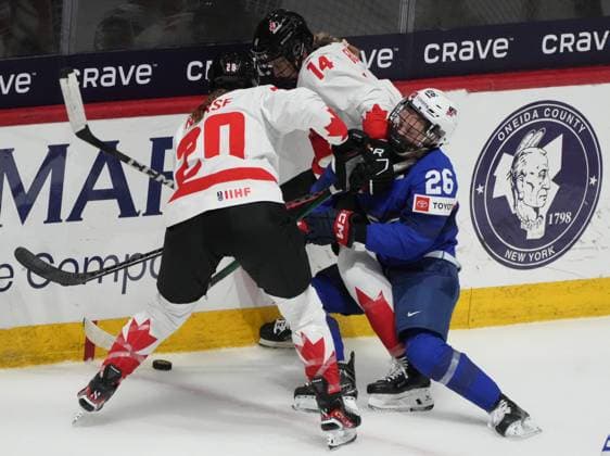 Sport Bilder des Tages April 8, 2024, Utica, Ny, UNITED STATES: United States Kendall Coyne Schofield (26) battles for the puck against Canada s Sarah Nurse (20) and Renata Fast (14) during first period hockey action at the IIHF Women s World Hockey Championship in Utica, N.Y., Monday, April 8, 2024. Canada News - April 8, 2024  - ZUMAc35_ 20240408_zaf_c35_245 Copyright: xChristinnexMuschix