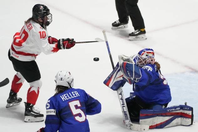 April 8, 2024, Utica, Ny, UNITED STATES: United States goaltender Aerin Frankel (31) makes a save as Canada s Sarah Fillier (10) looks for the rebound during first period hockey action at the IIHF Women s World Hockey Championship in Utica, N.Y., Monday, April 8, 2024. Canada News - April 8, 2024  - ZUMAc35_ 20240408_zaf_c35_246 Copyright: xChristinnexMuschix