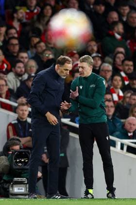 Bayern Munich manager Thomas Tuchel (L) is spoken to by the Fourth Official Adam Ladebäck (R) Arsenal v Bayern Munich, UEFA Champions League, Quarter Final, First Leg, Football, Emirates Stadium, London, UK - 09 Apr 2024 EDITORIAL USE ONLY No use with unauthorised audio, video, data, fixture lists, club league logos or live services. Online in-match use limited to 120 images, no video emulation. No use in betting, games or single club league player publications. Copyright: xSimonxDael Shutterstockx 14424047v