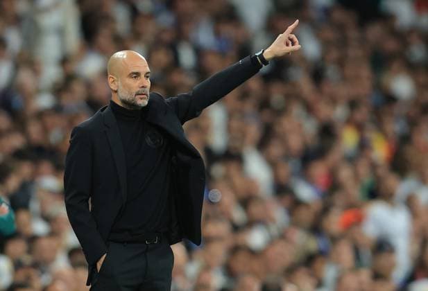 Madrid, Spain, 9th April 2024. Josep Guardiola coach of Manchester City up during the UEFA Champions League match at the Santiago Bernabau, Madrid. Picture credit should read: Paul Terry Sportimage EDITORIAL USE ONLY. No use with unauthorised audio, video, data, fixture lists, club league logos or live services. Online in-match use limited to 120 images, no video emulation. No use in betting, games or single club league player publications. SPI-3066-0042