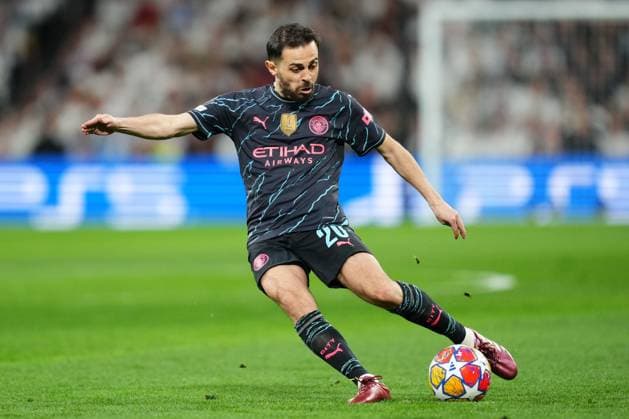 Bernardo Silva of Manchester City scores his goal Real Madrid and Manchester City. UEFA Champions League match. Quarter-finals, first leg. Football, Santiago Bernabeu Stadium, Madrid, Spain - 9 April 2024 Editorial use only  Copyright: xBaguxBlanco PRESSINPHOTO Shutterstockx 14427173a