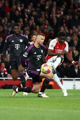 Bukayo Saka of Arsenal scores a goal for their side to make it 1-0 Arsenal v Bayern Munich, UEFA Champions League, Quarter Final, First Leg, Football, Emirates Stadium, London, UK - 09 Apr 2024 EDITORIAL USE ONLY No use with unauthorised audio, video, data, fixture lists, club league logos or live services. Online in-match use limited to 120 images, no video emulation. No use in betting, games or single club league player publications. Copyright: xSimonxDael Shutterstockx 14424047y