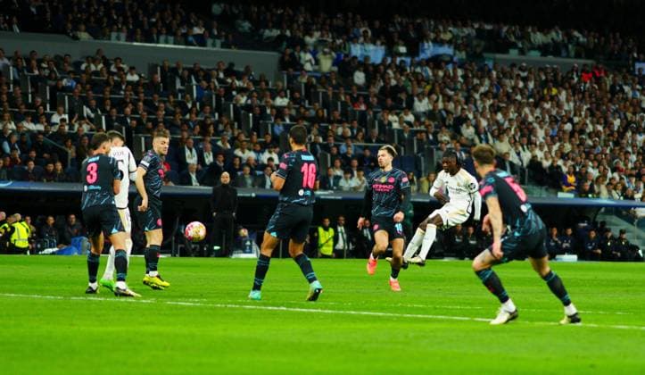 Eduardo Camavinga of Real Madrid scores a goal to make it 1-1 via a deflection off Ruben Dias of Manchester City Real Madrid v Manchester City, UEFA Champions League, Quarter Final, First Leg, Football, Santiago Bernabeu Stadium, Madrid, Spain - 09 Apr 2024 EDITORIAL USE ONLY No use with unauthorised audio, video, data, fixture lists, club league logos or live services. Online in-match use limited to 120 images, no video emulation. No use in betting, games or single club league player publications. Copyright: xJavierxGarcia Shutterstockx 14424044n