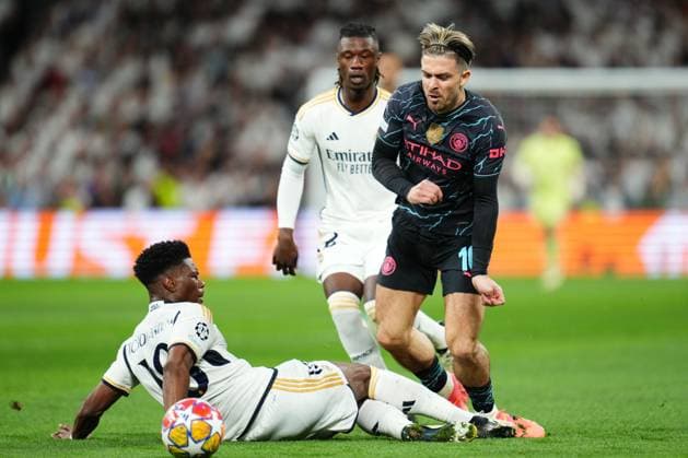 Jack Grealish of Manchester City and Eduardo Camavinga and Aurelien Tchouameni of Real Madrid Real Madrid and Manchester City. UEFA Champions League match. Quarter-finals, first leg. Football, Santiago Bernabeu Stadium, Madrid, Spain - 9 April 2024 Editorial use only  Copyright: xBaguxBlanco PRESSINPHOTO Shutterstockx 14427173f