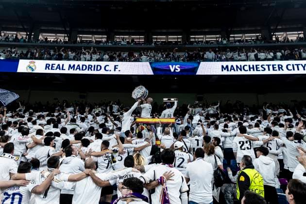 April 9, 2024, Madrid, Spain: Fans of Real Madrid show their support prior the UEFA Champions League quarter-final first leg match between Real Madrid CF and Manchester City at Estadio Santiago Bernabeu on April 09, 2024 in Madrid, Spain. Madrid Spain - ZUMAd159 20240409_zia_d159_018 Copyright: xGerardxFrancox