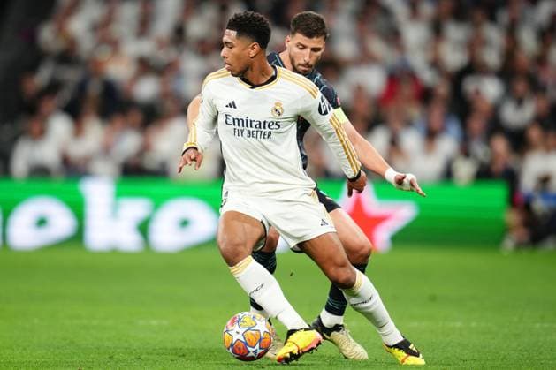 Jude Bellingham of Real Madrid and Ruben Dias of Manchester City Real Madrid and Manchester City. UEFA Champions League match. Quarter-finals, first leg. Football, Santiago Bernabeu Stadium, Madrid, Spain - 9 April 2024 Editorial use only  Copyright: xBaguxBlanco PRESSINPHOTO Shutterstockx 14427173z