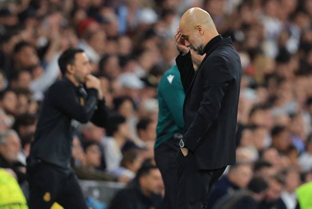 Madrid, Spain, 9th April 2024. Josep Guardiola coach of Manchester City reacts during the UEFA Champions League match at the Santiago Bernabau, Madrid. Picture credit should read: Paul Terry Sportimage EDITORIAL USE ONLY. No use with unauthorised audio, video, data, fixture lists, club league logos or live services. Online in-match use limited to 120 images, no video emulation. No use in betting, games or single club league player publications. SPI-3066-0053