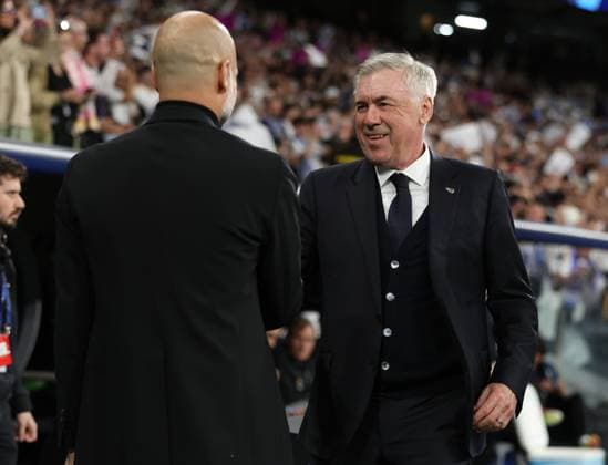 Madrid, Spain, 9th April 2024. Carlo Ancelotti manager of Real Madrid (R) greets Josep Guardiola coach of Manchester City during the UEFA Champions League match at the Santiago Bernabau, Madrid. Picture credit should read: Paul Terry Sportimage EDITORIAL USE ONLY. No use with unauthorised audio, video, data, fixture lists, club league logos or live services. Online in-match use limited to 120 images, no video emulation. No use in betting, games or single club league player publications. SPI-3066-0054