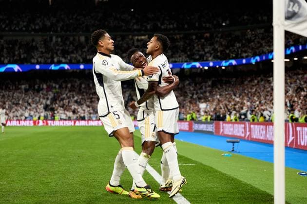 Rodrygo Goes of Real Madrid CF celebrating his goal with his teammates during the UEFA Champions League 2023 24 quarter-finals match between Real Madrid CF and Manchester City at Estadio Santiago Bernabeu on April 09, 2024 in Madrid, Spain. FOOTBALL : Real Madrid vs Manchester City - UEFA Ligue des Champions - 1 4 Quart - 09 04 2024 LGM Panoramic 