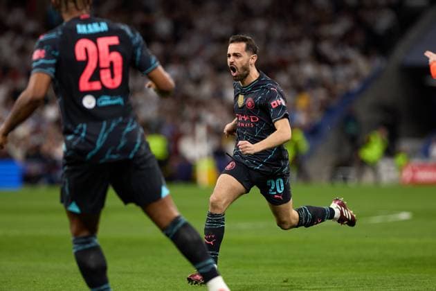 April 9, 2024, Madrid, Spain: Bernardo Silva of Manchester City celebrates a goal during the UEFA Champions League quarter-final first leg match between Real Madrid CF and Manchester City at Estadio Santiago Bernabeu on April 09, 2024 in Madrid, Spain. Madrid Spain - ZUMAd159 20240409_zia_d159_045 Copyright: xGerardxFrancox