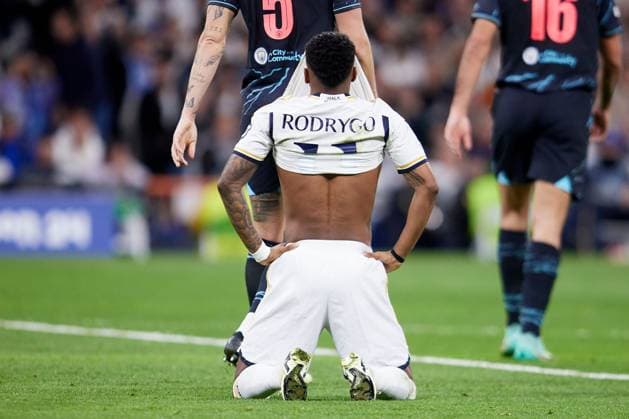 Rodrygo Goes of Real Madrid CF lamenting Real Madrid v Manchester City, UEFA Champions League, Quarter Final, First Leg, Football, Santiago Bernabeu Stadium, Madrid, Spain - 09 Apr 2024 EDITORIAL USE ONLY No use with unauthorised audio, video, data, fixture lists, club league logos or live services. Online in-match use limited to 120 images, no video emulation. No use in betting, games or single club league player publications. Copyright: xRubenxAlbarran Shutterstockx 14425023ax