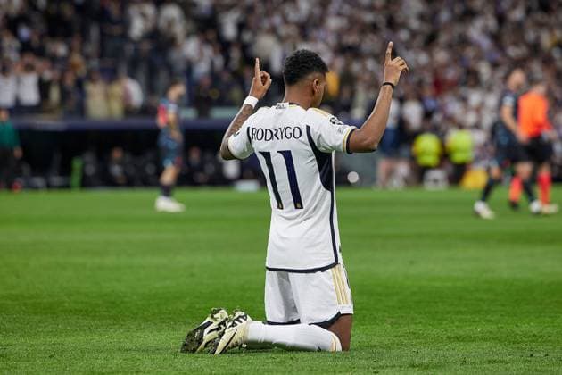 Rodrygo Goes of Real Madrid CF celebrates after scoring a goal Real Madrid v Manchester City, UEFA Champions League, Quarter Final, First Leg, Football, Santiago Bernabeu Stadium, Madrid, Spain - 09 Apr 2024 EDITORIAL USE ONLY No use with unauthorised audio, video, data, fixture lists, club league logos or live services. Online in-match use limited to 120 images, no video emulation. No use in betting, games or single club league player publications. Copyright: xRubenxAlbarran Shutterstockx 14425023ad