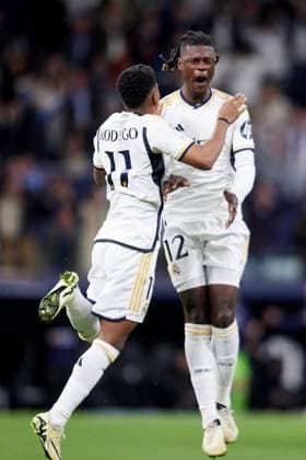 Rodrygo Goes and Eduardo Camavinga of Real Madrid CF celebrates after scoring a goal Real Madrid v Manchester City, UEFA Champions League, Quarter Final, First Leg, Football, Santiago Bernabeu Stadium, Madrid, Spain - 09 Apr 2024 EDITORIAL USE ONLY No use with unauthorised audio, video, data, fixture lists, club league logos or live services. Online in-match use limited to 120 images, no video emulation. No use in betting, games or single club league player publications. Copyright: xRubenxAlbarran Shutterstockx 14425023cl