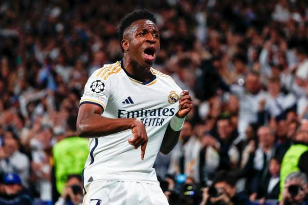 Sport Bilder des Tages April 9, 2024, Madrid, Madrid, SPAIN: Vinicius Junior celebrates a goal scored by Rodrygo Goes of Real Madrid (out of photo) during the UEFA Champions League, Quarter finals, football match played between Real Madrid and Manchester City at Santiago Bernabeu stadium on April 9, 2024, in Madrid, Spain. Madrid SPAIN - ZUMAa181 20240409_zaa_a181_004 Copyright: xIrinaxR.xHipolitox