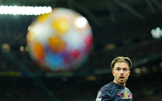 Jack Grealish of Manchester City Real Madrid v Manchester City, UEFA Champions League, Quarter Final, First Leg, Football, Santiago Bernabeu Stadium, Madrid, Spain - 09 Apr 2024 EDITORIAL USE ONLY No use with unauthorised audio, video, data, fixture lists, club league logos or live services. Online in-match use limited to 120 images, no video emulation. No use in betting, games or single club league player publications. Copyright: xJavierxGarcia Shutterstockx 14424044ag
