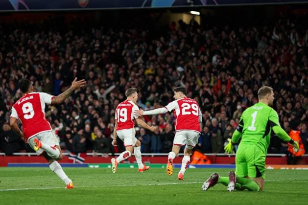 London, England, 9th April 2024. Leandro Trossard of Arsenal celebrates scoring their side s second goal of the game during the UEFA Champions League match at the Emirates Stadium, London. Picture credit should read: Kieran Cleeves Sportimage EDITORIAL USE ONLY. No use with unauthorised audio, video, data, fixture lists, club league logos or live services. Online in-match use limited to 120 images, no video emulation. No use in betting, games or single club league player publications. SPI-3065-0028