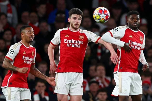 Raphaël Guerreiro of Bayern Munich takes a free-kick into the Arsenal defensive wall containing Gabriel Jesus (L), Declan Rice and Thomas Partey of Arsenal (R) Arsenal v Bayern Munich, UEFA Champions League, Quarter Final, First Leg, Football, Emirates Stadium, London, UK - 09 Apr 2024 EDITORIAL USE ONLY No use with unauthorised audio, video, data, fixture lists, club league logos or live services. Online in-match use limited to 120 images, no video emulation. No use in betting, games or single club league player publications. Copyright: xSimonxDael Shutterstockx 14424047cp