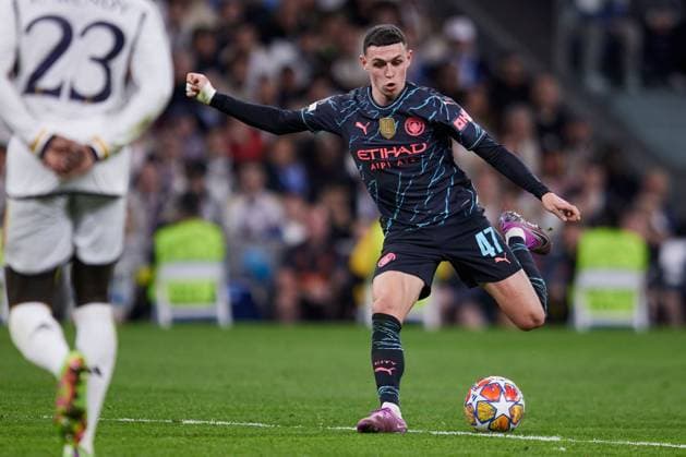 Phil Foden of Manchester City FC Real Madrid v Manchester City, UEFA Champions League, Quarter Final, First Leg, Football, Santiago Bernabeu Stadium, Madrid, Spain - 09 Apr 2024 EDITORIAL USE ONLY No use with unauthorised audio, video, data, fixture lists, club league logos or live services. Online in-match use limited to 120 images, no video emulation. No use in betting, games or single club league player publications. Copyright: xRubenxAlbarran Shutterstockx 14425023dv