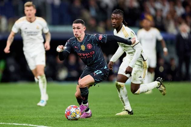 Phil Foden of Manchester City scores his goal during the UEFA Champions League 2023 24 quarter-finals match between Real Madrid CF and Manchester City at Estadio Santiago Bernabeu on April 09, 2024 in Madrid, Spain. FOOTBALL : Real Madrid vs Manchester City - UEFA Ligue des Champions - 1 4 Quart - 09 04 2024 LGM Panoramic 