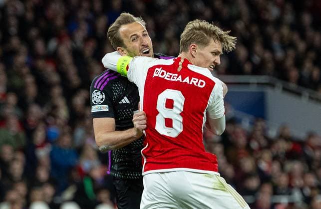 Football - UEFA Champions League - Quarter-Final 1st Leg - Arsenal FC v FC Bayern Munich LONDON, ENGLAND - Tuesday, April 9, 2024: Bayern Munich s Harry Kane (L) is challenged by Arsenal s captain Martin odegaard during the UEFA Champions League Quarter-Final 1st Leg game between Arsenal FC and FC Bayern Munich at the Emirates Stadium. (Photo by David Rawcliffe Propaganda) LONDON Emirates Stadium GREATER LONDON ENGLAND  Copyright: xDavidxRawcliffex P2024-04-09-Arsenal_Bayern_Munich-52