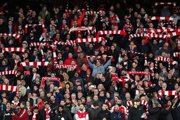 London, England, 9th April 2024. Arsenal fans in the stand before the UEFA Champions League match at the Emirates Stadium, London. Picture credit should read: Kieran Cleeves Sportimage EDITORIAL USE ONLY. No use with unauthorised audio, video, data, fixture lists, club league logos or live services. Online in-match use limited to 120 images, no video emulation. No use in betting, games or single club league player publications. SPI-3065-0050